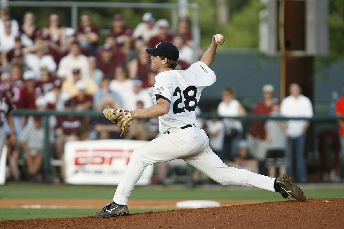 Baseball batter swinging at a pitch during a game